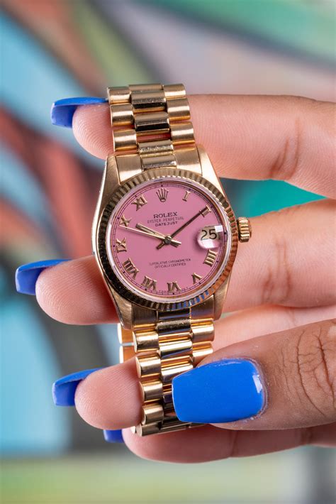 Rolex watch pink face